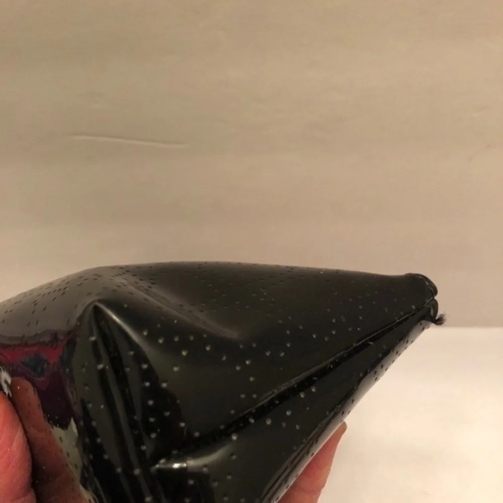 Kate spade black perforated cosmetic makeup case
